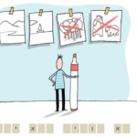 אדם מחזיק טוש גדול ולפניו תלויים על הקיר ארבעה ציורים על שתיים מהם: דובים, יער- מסומן X.